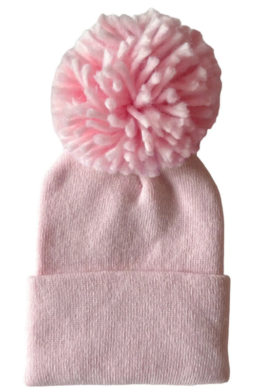 Baby’s first hat, petal pink Pom